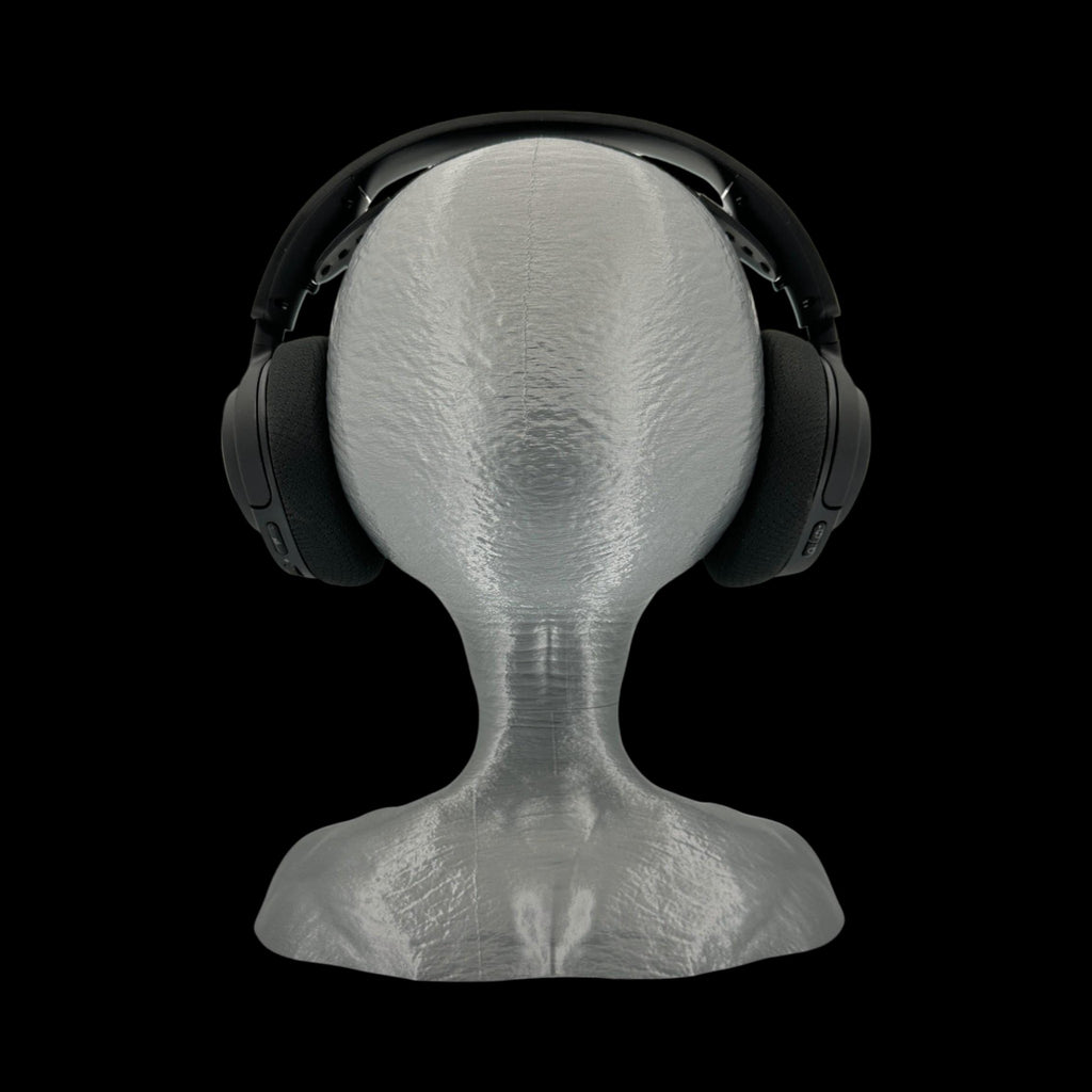 Grey Alien Headphone Stand – 12" — on display stand, 3D printed replica on black background