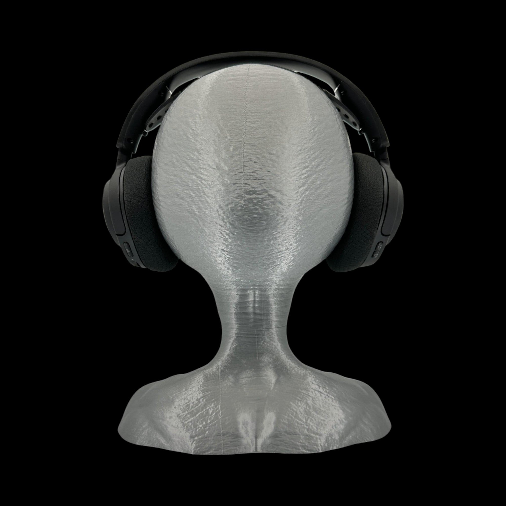 Grey Alien Headphone Stand – 12" — on display stand, 3D printed replica on black background