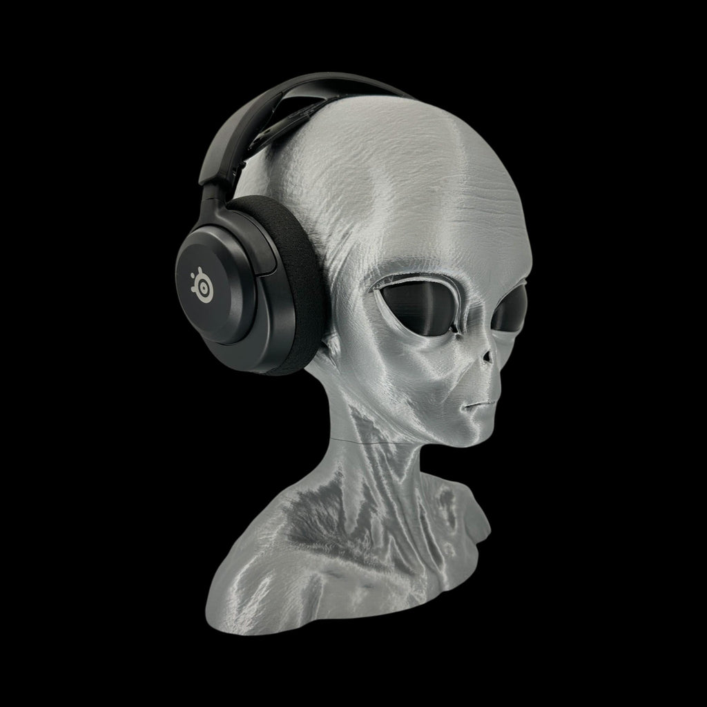 Grey Alien Headphone Stand – 12" — on display stand, 3D printed replica on black background