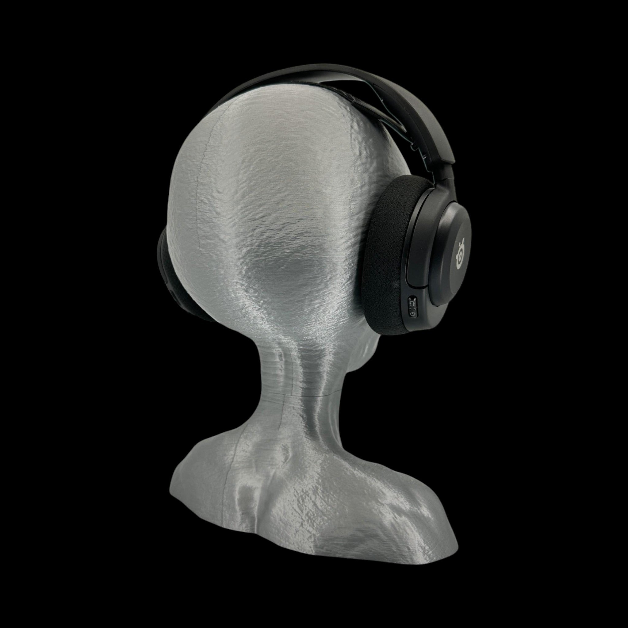 Grey Alien Headphone Stand – 12" — on display stand, 3D printed replica on black background